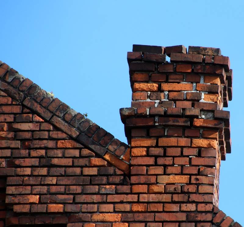Signs Your Wauconda Home Needs a Chimney Inspection Damaged chimney on an Wauconda home showing cracks and missing mortar